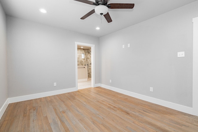 spare room with recessed lighting, light wood-type flooring, baseboards, and ceiling fan