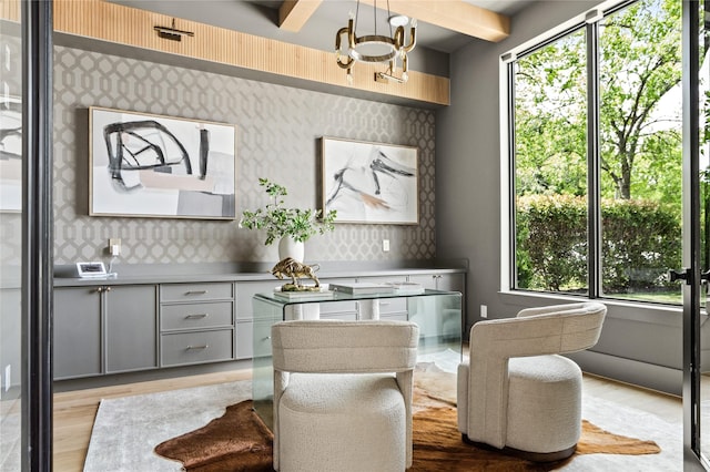 11736 Jamestown Rd, Dallas, TX 75230 - dining space with wallpapered walls, plenty of natural light, light wood-type flooring, and beamed ceiling