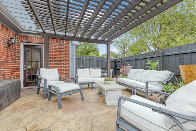 view of patio with a fenced backyard, a pergola, and an outdoor hangout area