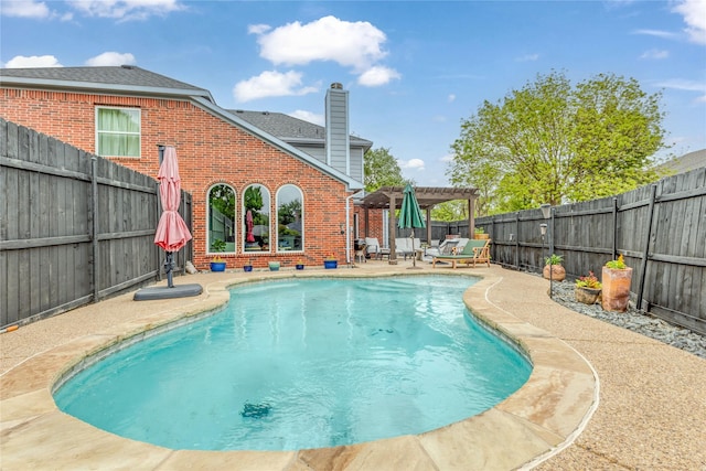 view of pool featuring a pergola, a patio area, a fenced in pool, and a fenced backyard