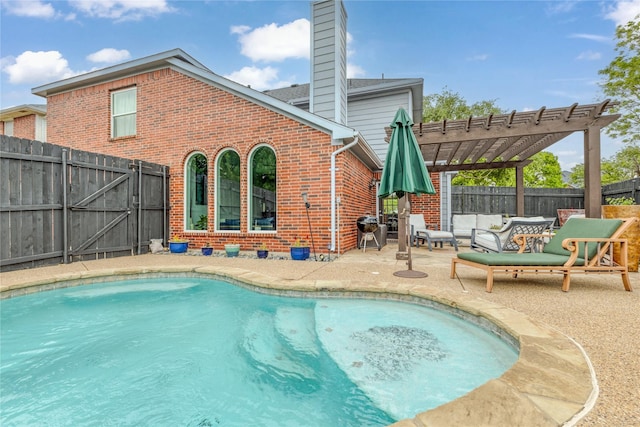 view of swimming pool featuring a fenced backyard, a pergola, a patio area, and a fenced in pool