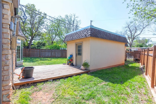view of shed featuring a fenced backyard