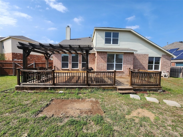 529 Roundrock Ln, Fort Worth, TX 76140 - rear view of house with a yard, brick siding, a fenced backyard, and a pergola