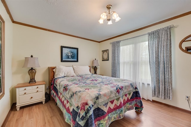 bedroom with light wood-type flooring, baseboards, a chandelier, and crown molding
