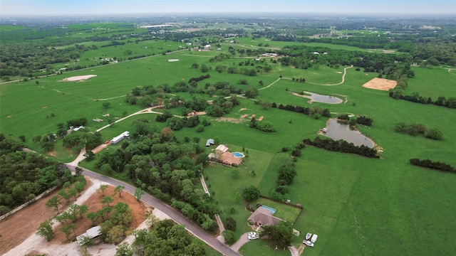 birds eye view of property featuring a rural view