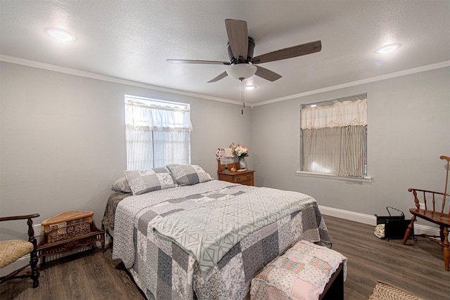 266 Yorkshire Dr, Gordonville, TX 76245 - bedroom featuring ornamental molding, baseboards, dark wood-style flooring, and ceiling fan