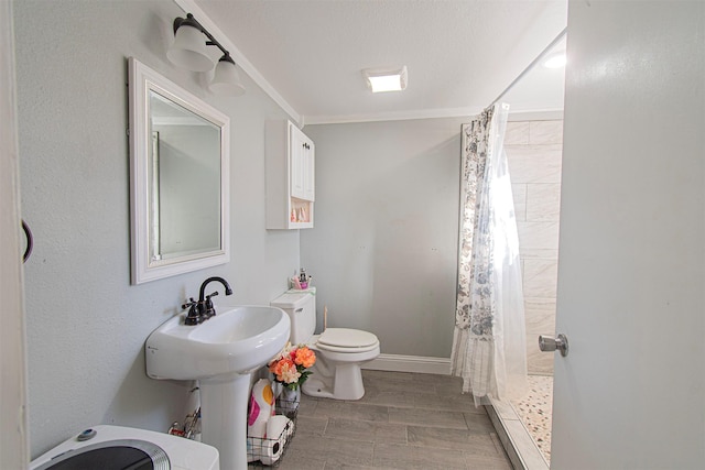 266 Yorkshire Dr, Gordonville, TX 76245 - ensuite bathroom with a sink, tiled shower, wood finished floors, ceiling fan, and crown molding