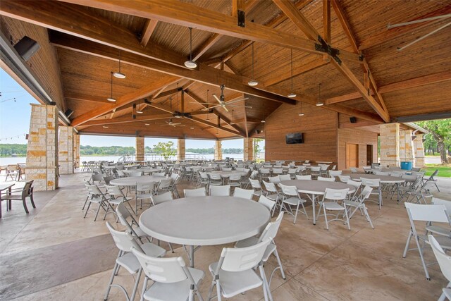 view of patio with ceiling fan, outdoor dining area, and a gazebo