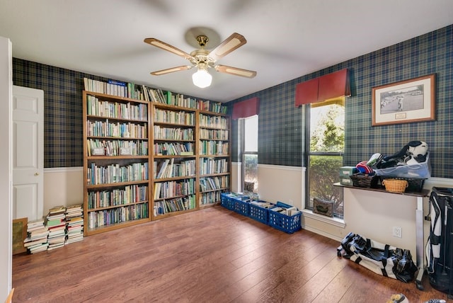 104 Kiowa Dr N, Gainesville, TX 76240 - living area with ceiling fan, wood-type flooring, and wallpapered walls