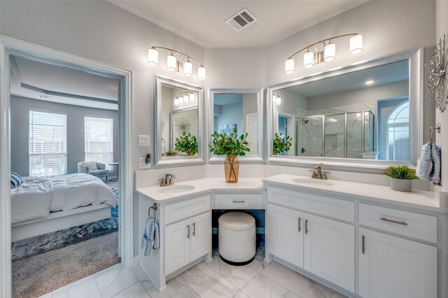 full bathroom with visible vents, vanity, marble finish floor, ensuite bathroom, and a stall shower