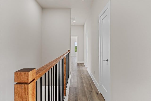 5426 Van Horn Dr, Granbury, TX 76048 - hallway featuring baseboards and wood finished floors