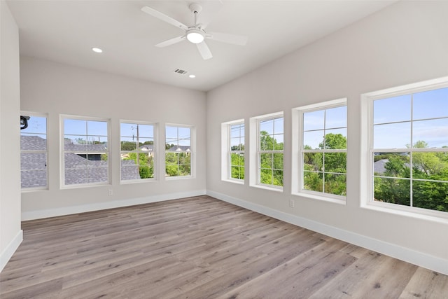 5426 Van Horn Dr, Granbury, TX 76048 - unfurnished sunroom featuring wood finished floors, a wooden deck, baseboards, visible vents, and recessed lighting