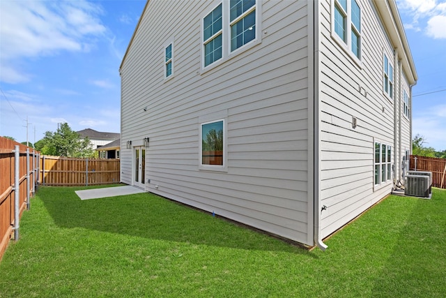 5426 Van Horn Dr, Granbury, TX 76048 - back of property with a fenced backyard, a patio area, a yard, and cooling unit