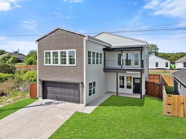 5426 Van Horn Dr, Granbury, TX 76048 - back of property featuring concrete driveway, fence, a garage, a lawn, and a balcony
