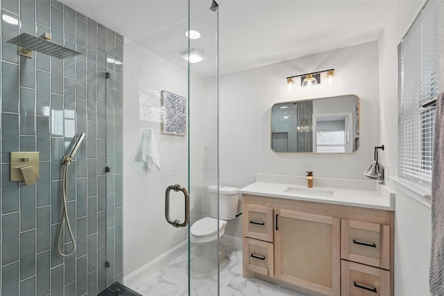 841 Lake Terrace Cir, Dallas, TX 75218 - bathroom featuring marble finish flooring, vanity, toilet, a stall shower, and baseboards