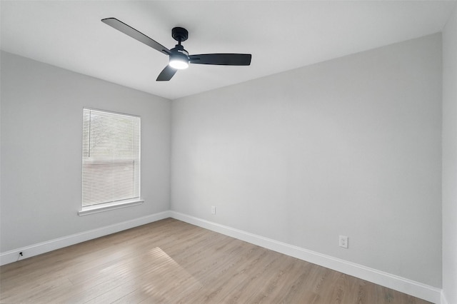 841 Lake Terrace Cir, Dallas, TX 75218 - spare room featuring light wood finished floors, ceiling fan, and baseboards