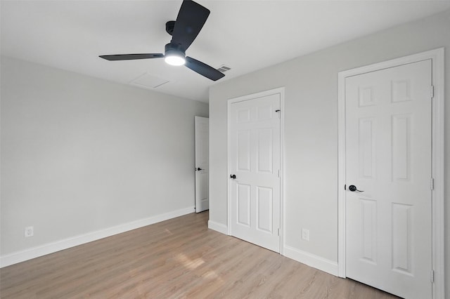 841 Lake Terrace Cir, Dallas, TX 75218 - unfurnished bedroom featuring light wood-type flooring, baseboards, and ceiling fan