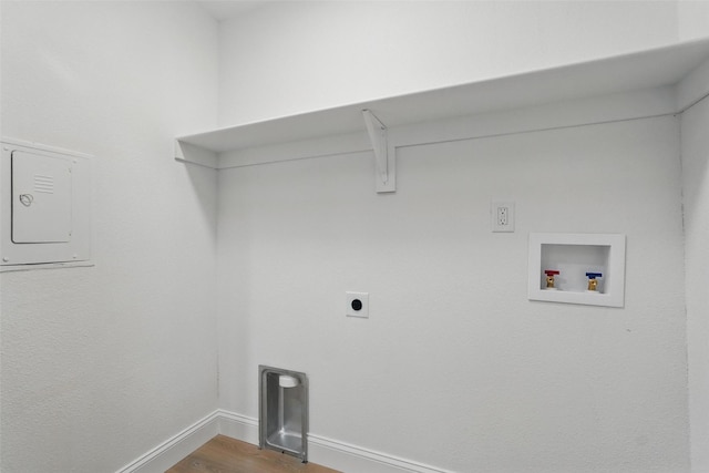 841 Lake Terrace Cir, Dallas, TX 75218 - laundry room featuring electric panel, washer hookup, wood finished floors, hookup for an electric dryer, and baseboards