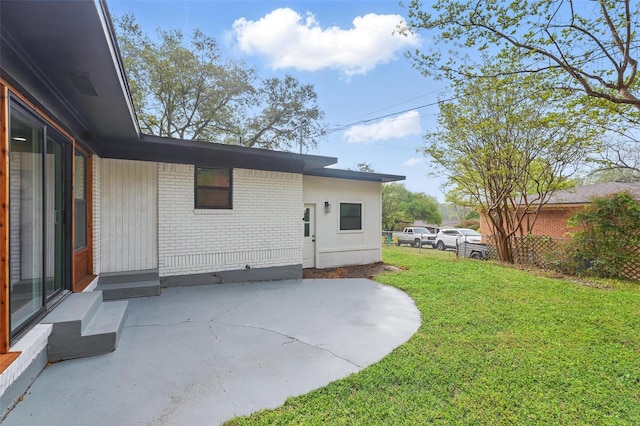 841 Lake Terrace Cir, Dallas, TX 75218 - rear view of property featuring brick siding, a patio, and entry steps