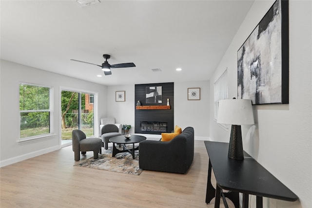 841 Lake Terrace Cir, Dallas, TX 75218 - living room with baseboards, a large fireplace, recessed lighting, wood finished floors, and a ceiling fan