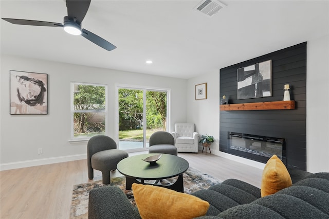 841 Lake Terrace Cir, Dallas, TX 75218 - living room with wood finished floors, a large fireplace, baseboards, a ceiling fan, and recessed lighting