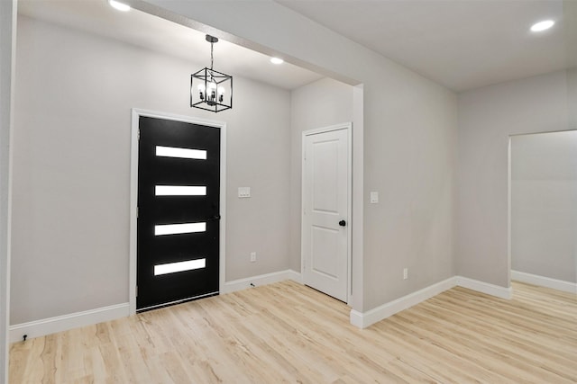 208 Splitrail Dr, Mabank, TX 75143 - entrance foyer featuring recessed lighting, wood finished floors, baseboards, and an inviting chandelier