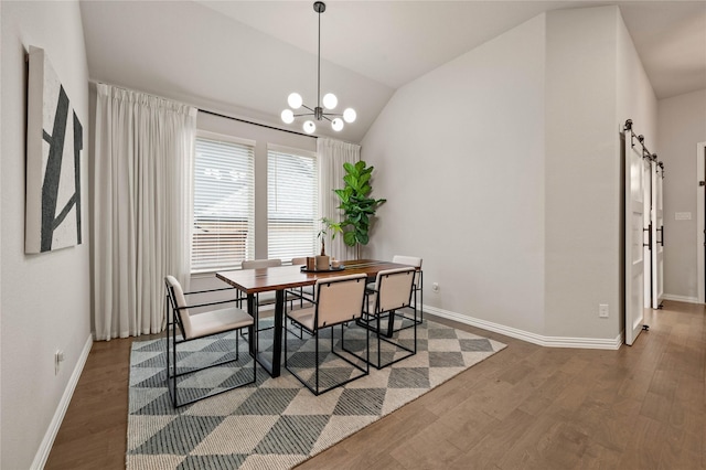 11721 Bull Creek Dr, Northlake, TX 76226 - dining area with wood finished floors, a chandelier, and lofted ceiling