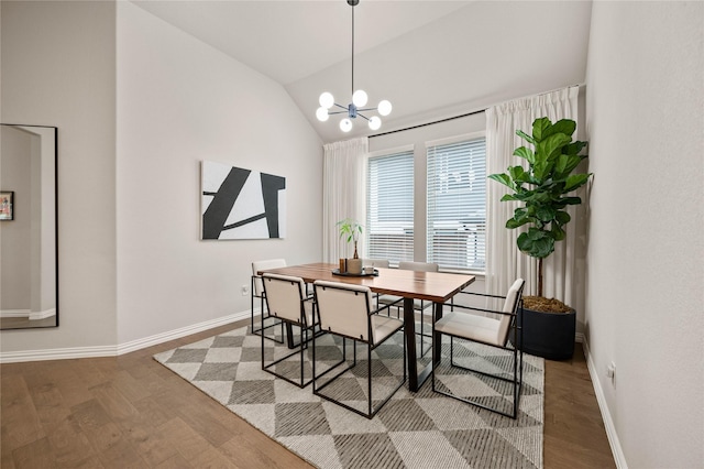 11721 Bull Creek Dr, Northlake, TX 76226 - dining space featuring vaulted ceiling, wood finished floors, and a chandelier