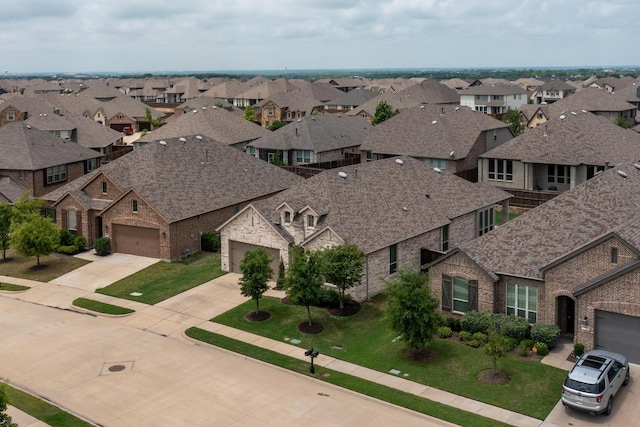 drone / aerial view with a residential view