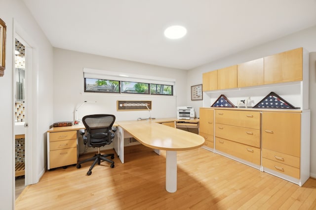 home office featuring light wood-type flooring