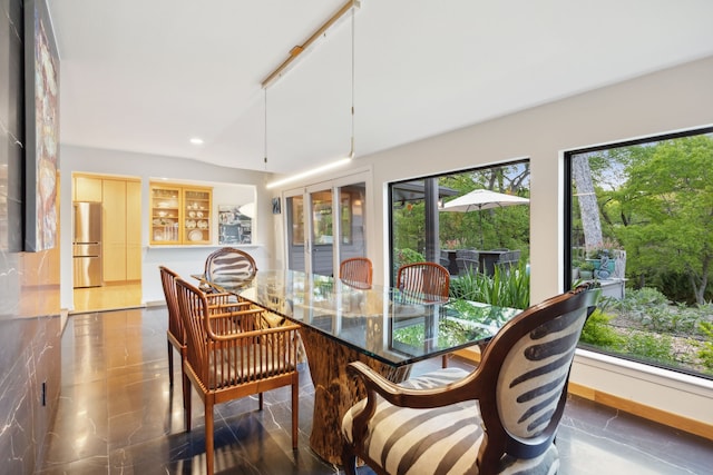 dining room with recessed lighting