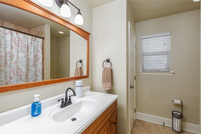 113 S Hill Top Ct, Springtown, TX 76082 - bathroom with a shower with shower curtain, baseboards, and vanity