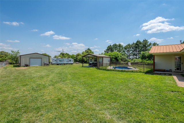 113 S Hill Top Ct, Springtown, TX 76082 - view of yard featuring a garage, a fenced in pool, an outbuilding, and fence