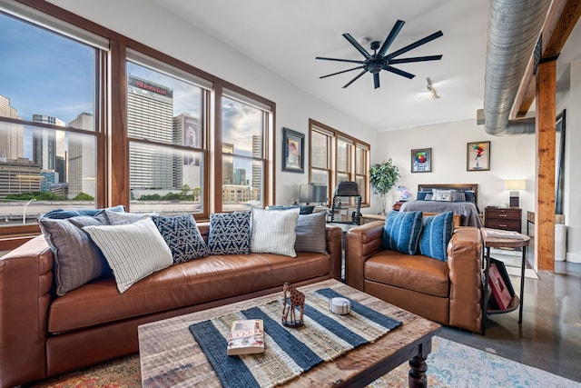 2502 Live Oak St Unit 332, Dallas, TX 75204 - living room featuring plenty of natural light, ceiling fan, and finished concrete flooring