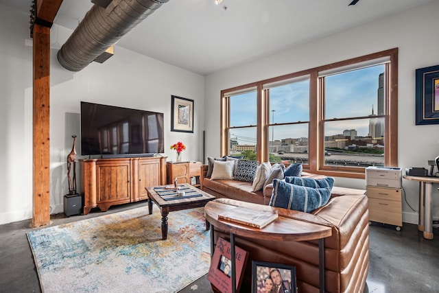 2502 Live Oak St Unit 332, Dallas, TX 75204 - living area featuring concrete floors and baseboards