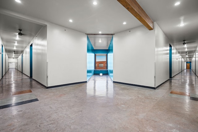 2502 Live Oak St Unit 332, Dallas, TX 75204 - hall with concrete flooring, beamed ceiling, recessed lighting, and baseboards