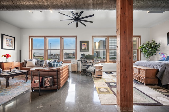 2502 Live Oak St Unit 332, Dallas, TX 75204 - living area with concrete flooring, ornate columns, ceiling fan, and an office area
