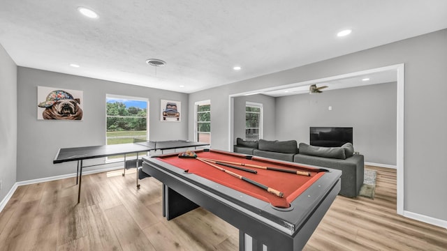 game room with light wood-type flooring, baseboards, and pool table