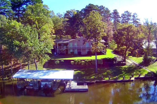 drone / aerial view with a water view