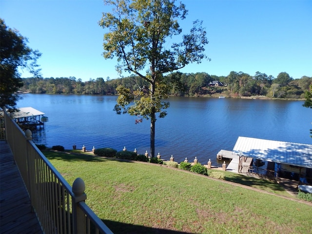 property view of water with a dock