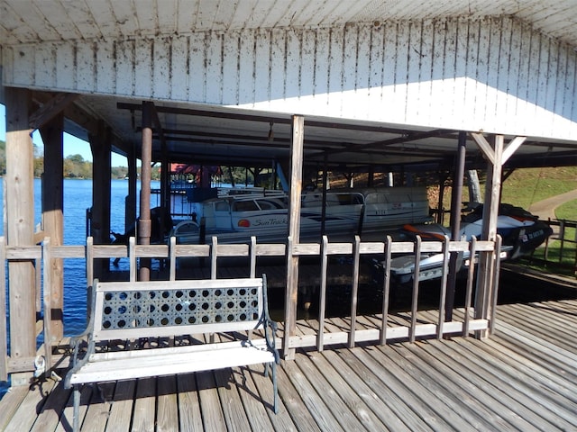 dock area with a water view