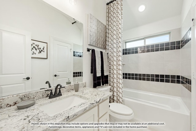 bathroom featuring shower / tub combo with curtain, toilet, and vanity