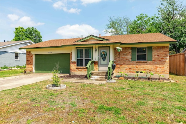 ranch-style house with fence, brick siding, a front yard, and a garage