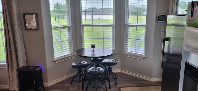 35 County Road 2342, Sulphur Springs, TX 75482 - dining space with baseboards and wood finished floors