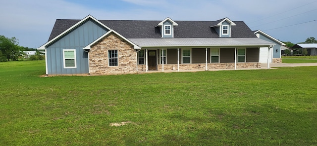 35 County Road 2342, Sulphur Springs, TX 75482 - view of front of house featuring board and batten siding, a shingled roof, a porch, and a front yard