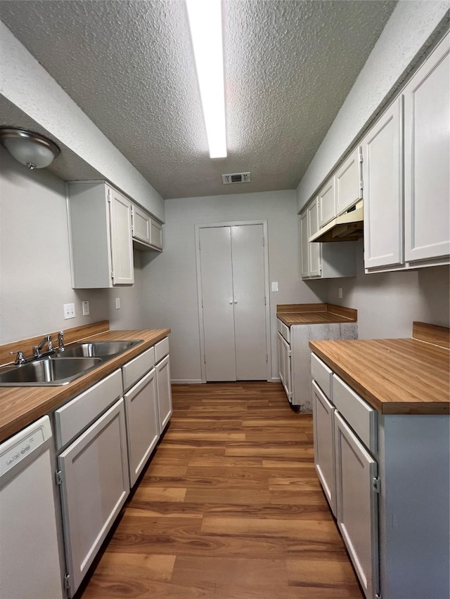 800 Woodland Ct, Kennedale, TX 76060 - kitchen featuring butcher block counters, white dishwasher, a sink, and gray cabinets