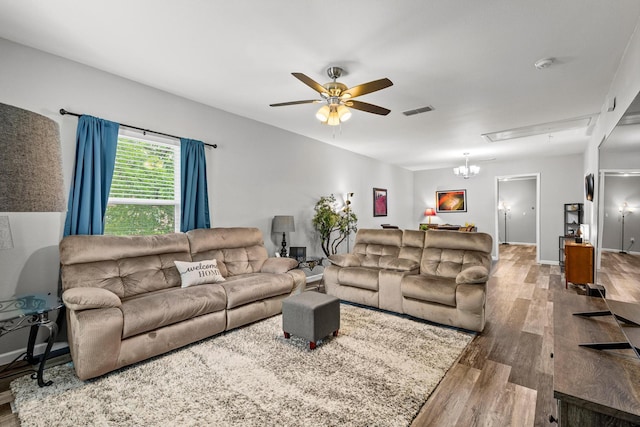 1425 E Cherry, Sherman, TX 75090 - living room featuring attic access, baseboards, visible vents, a ceiling fan, and wood finished floors