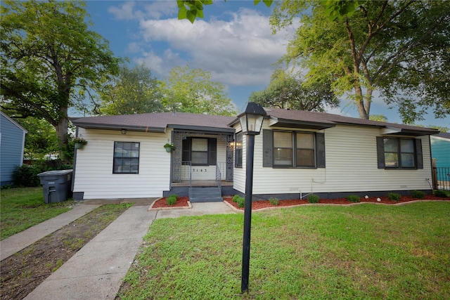 3143 Grayson Dr, Dallas, TX 75224 - view of front of home with a front lawn and crawl space