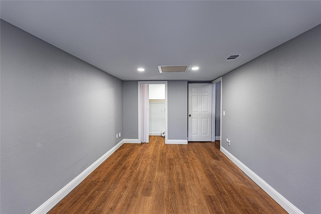 3143 Grayson Dr, Dallas, TX 75224 - unfurnished bedroom with baseboards, dark wood-style flooring, recessed lighting, and a closet
