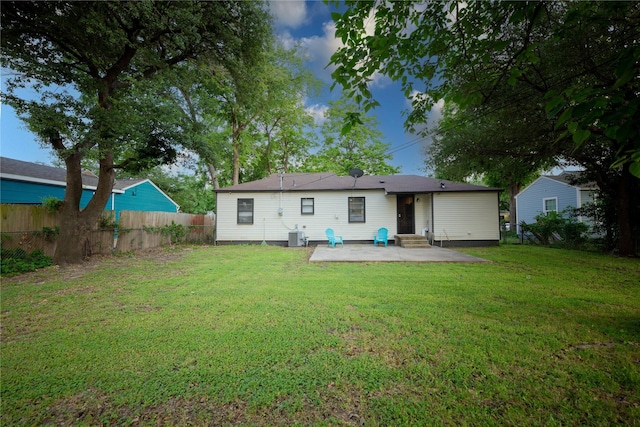 3143 Grayson Dr, Dallas, TX 75224 - rear view of property featuring a patio, entry steps, and central AC